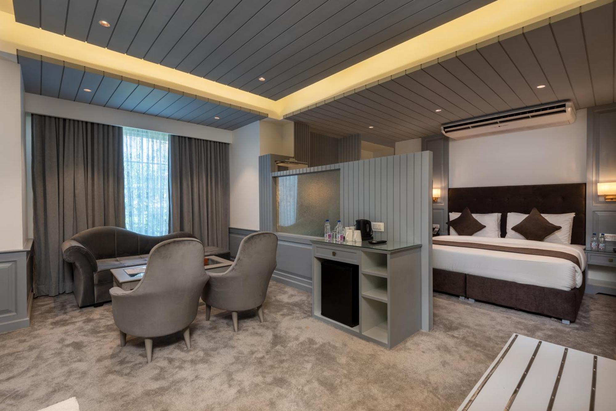 Hotel Grand Boulevard Durgjan 部屋 写真