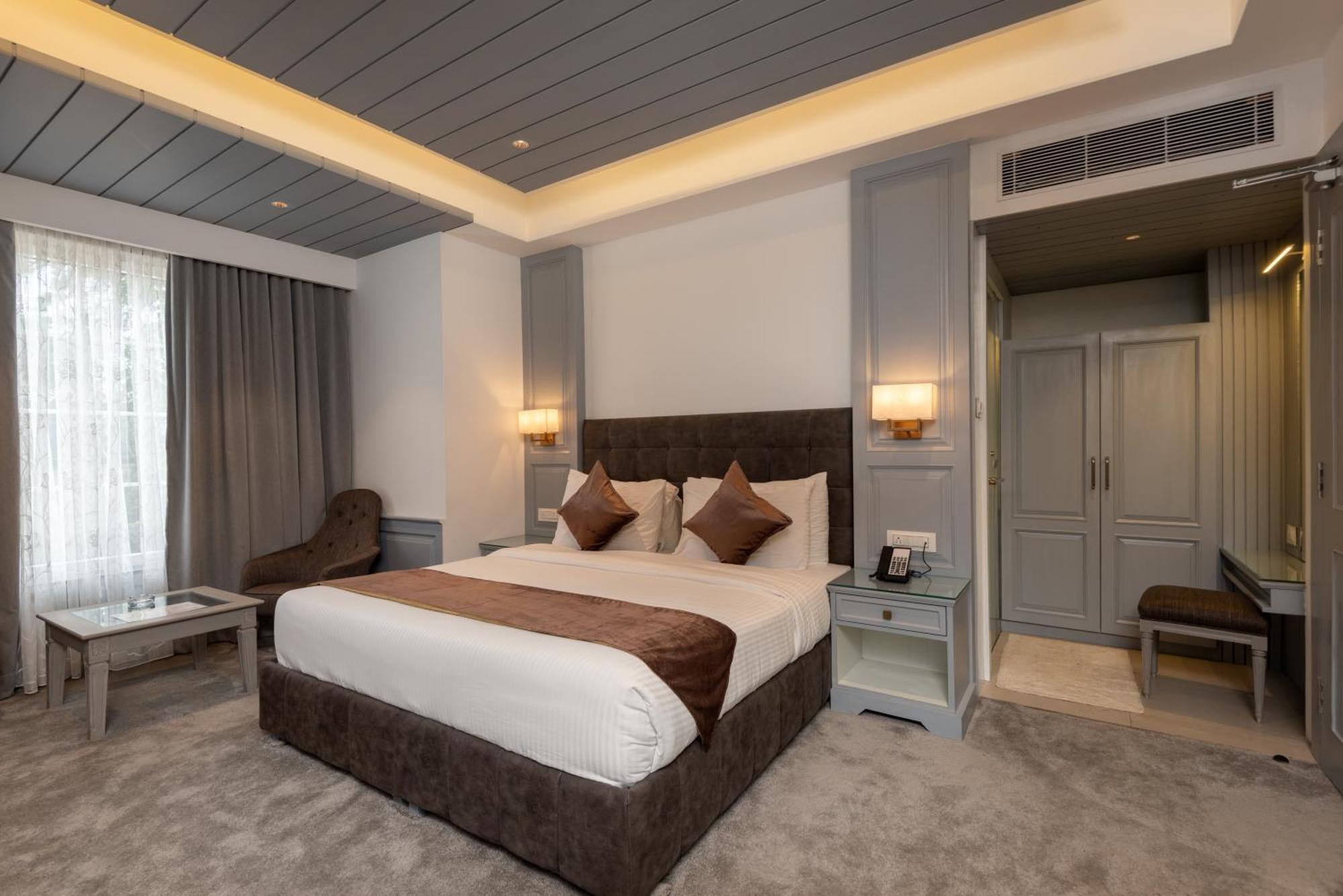 Hotel Grand Boulevard Durgjan 部屋 写真